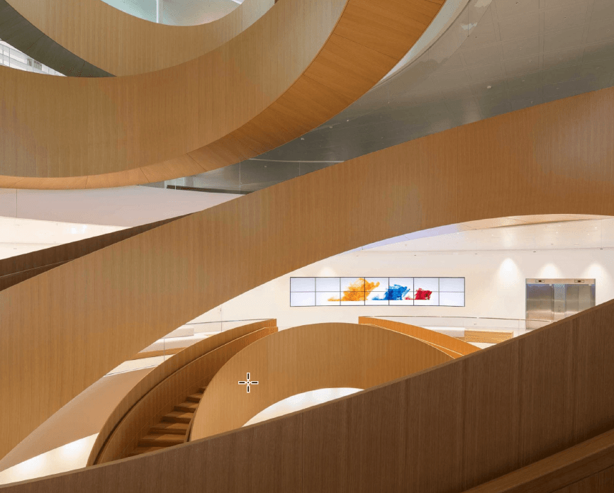 Studio banana a dessiné ces escaliers de bois en forme de volutes très aériens